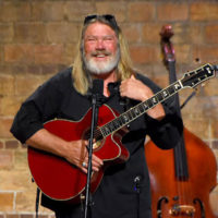Bill Kaman of Ovation Guitars at the Steve Sutton benefit concert  - photo by Wayne Ebinger