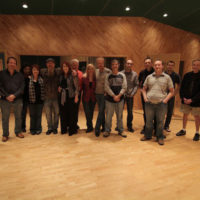 The whole Davis Family in the recording studio with backing musicians