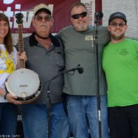 New banjo presented for student use at the 2019 Charlotte Bluegrass Festival - photo © Bill Warren