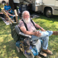 Have chair, will travel at the 2019 John Hartford Memorial Festival at Bean Blossom - photo by Dave Berry