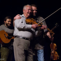 Hughie Smith getting awarded his trophy and playing a song for being the oldest fiddler this year at 86 at Weiser 2019 - photo © Tara Linhardt