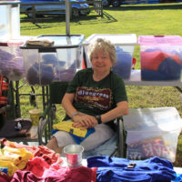 T-shirts galore at the 2019 Willow Oak Park Bluegrass Festival - photo by Laura Ridge