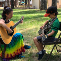 Guitar lesson at the CBA Youth Academy Camp - photo by Dave Berry
