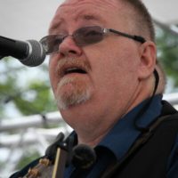 Eddie Gill with Big Country Bluegrass at the 2019 Remington Ryde Bluegrass Festival - photo by Frank Baker