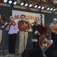 Adam Burrows and Stanley Efaw twin fiddle with Tony Holt & The Wildwood Valley Boys at the 2019 Marshall Bluegrass Festival - photo © Bill Warren
