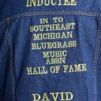David Conley Sr. was awarded this commemorative jacket at the 2019 Marshall Bluegrass Festival - photo © Bill Warren