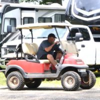 Golf carts are the preferred means of transport at the 2019 Milan Bluegrass Festival - photo © Bill Warren