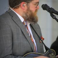 Nathan Livers with Michael Cleveland & Flamekeeper at the 2019 Bluegrass on the Grass - photo by Frank Baker