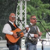 Caney Creek is singin' in the rain at the 2019 Remington Ryde Bluegrass Festival - photo by Frank Baker