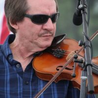 Tim Laughlin with Big Country Bluegrass at the 2019 Remington Ryde Bluegrass Festival - photo by Frank Baker