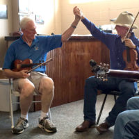 Ridge Roberts jamming with Byron Berline at the newly reopened Double Stop Fiddle Shop - photo by Pamm Tucker
