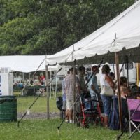 In from the rain at the 2019 Remington Ryde Bluegrass Festival - photo by Frank Baker