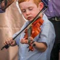 Bodie Frankhouser with Remington Ryde at the 2019 Remington Ryde Bluegrass Festival - photo by Frank Baker