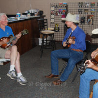 Ridge Roberts jamming with Byron Berline at the newly reopened Double Stop Fiddle Shop - photo by Pamm Tucker