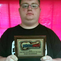 Evan Dickerson receives an award for his help at the 2019 Mansfield Jamfest