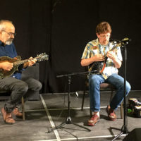 John Reischman and Tim O'Brien host a mandolin workshop at the 2019 Blueberry Bluegrass Festival - photo by Donald Teplyske