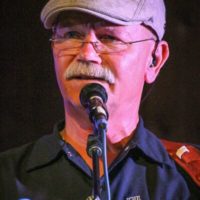 Fred Travers with Seldom Scene at the August 2019 Gettysburg Bluegrass Festival - photo by Frank Baker