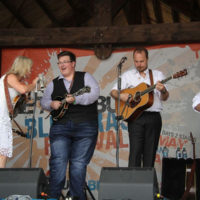Ryan Paisley sings with Rhonda Vincent at the 2019 Gettysburg Bluegrass Festival - photo by Frank Baker