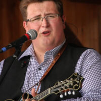 Ryan Paisley sings with his dad's band at the 2019 Gettysburg Bluegrass Festival - photo by Frank Baker