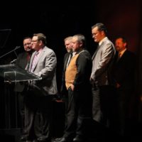 Joe Mullins & The Radio Ramblers accept at the 2019 IBMA Awards Show - photo by Frank Baker