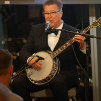 Ned Luberecki hosts the induction ceremony for the Hall of Fame at the American Banjo Museum (9/6/19) - photo © Pamm Tucker
