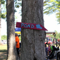 This way to the pond at the 2019 Camp Springs festival - photo by Laura Ridge