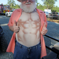 Red Roberts flexing at the 2019 Camp Springs festival - photo by Laura Ridge