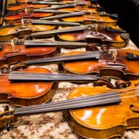 Fiddles in the Exhibit Hall at World of Bluegrass 2019 - photo © Tara Linhardt