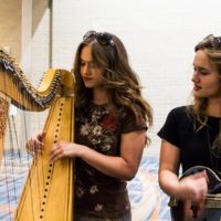 Hallway harp jam at World of Bluegrass 2019 - photo © Tara Linhardt