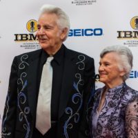 Del and Jean McCoury on the Red Capet prior to the IBMA Awards Show - photo © Tara Linhardt