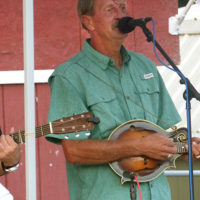 Jim Burris with Grass Strings at the 2019 Grass on the Farm festival - photo by Sandy Hatley