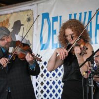 Nate Lee and Becky Buller twinning at the 2019 Delaware Valley Bluegrass Festival - photo by Frank Baker