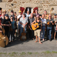 Group photo of all the jammers at Eric and Edmée Denéve's bluegrass weekend in France - photo by Charley Sifaoui