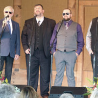 Doyle Lawson & Quicksilver quartet sings at Brown Loflin's funeral at Denton Farm Park (9/16/19) - photo by Gary Hatley