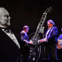 Rob Ickes, Jerry Douglas and Shawn Camp in the Mike Auldridge tribute at the 2019 IBMA Awards Show - photo by Frank Baker