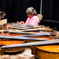 Fiddles in the Exhibit Hall at World of Bluegrass 2019 - photo © Tara Linhardt