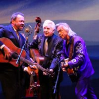 Dan Tyminski, Del McCoury, and Jim Lauderdale at the 2019 IBMA Awards Show - photo by Frank Baker
