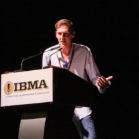 Daniel Amick accepts his Instrumentalist of the Year trophy at the 2019 IBMA Momentum Awards - photo by Frank Baker