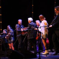 Michael Cleveland, Sierra Hull, Dan Tyminski, Del McCoury, Jim Lauderdale, Molly Tuttle, and Jerry Douglas at the 2019 IBMA Awards Show - photo by Frank Baker