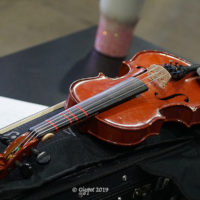 Fiddle awaits its turn at the 2019 Oklahoma State Fiddling & Picking Contest - photo © Pamm Tucker