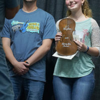 Baylee Sidden with her JC Broughton award at the 2019 Oklahoma State Fiddling & Picking Contest - photo © Pamm Tucker