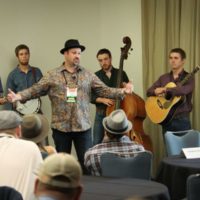 Stephen Mougin offers band coaching at World of Bluegrass 2019 - photo by Frank Baker