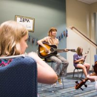 Molly Tuttle leads a youth jam at Wide Open Bluegrass 2019 - photo © Tara Linhardt