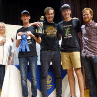 First Place Bluegrass Band, Blu Astro Turf, at the 2019 Granite Quarry Fiddlers' Convention (l-r) Vivian Hopkins (convention coordinator) Daniel Thrailkill (guitarist), Alex Edwards (banjoist), Jonah Horton (mandolinist), Will Thrailkill (bassist) (Note: this band may be recognized as another well known NC ensemble, Trailblazers)