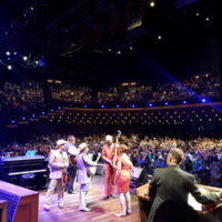 Po' Ramblin' Boys turning back to the audience after Bill Cody told them they had gotten a standing ovation - photo by Mike Drudge