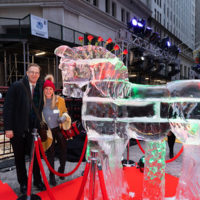Jenn and James Chandler with an ice sculpture at the 2019 New York Stock Exchange Christ Tree Lighting (12/5/19) - photo by Rhonda Vincent
