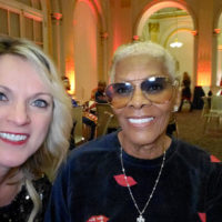 Rhonda Vincent grabs a selfie with Dionne Warwick at the 2019 New York Stock Exchange Christ Tree Lighting (12/5/19)