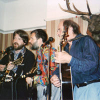 Andy, Rick, and others playing with Bill Clifton when he performed at the Greyhound pub, Wadhurst, circa 1990
