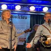 Lorraine Jordan and Larry Efaw share a laugh at the 2019 Bluegrass Christmas in the Smokies - photo by Melanie Wilson