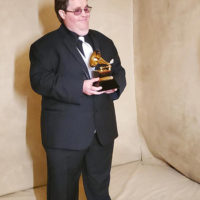 Michael Cleveland with his 2020 Grammy award for Best Bluegrass Album